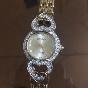 Armitron Now gold watch